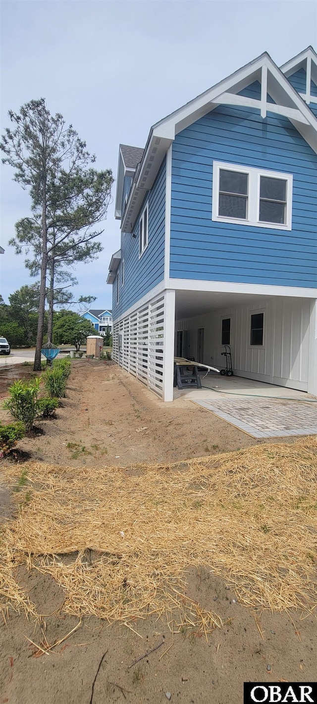 exterior space featuring a patio area and a carport