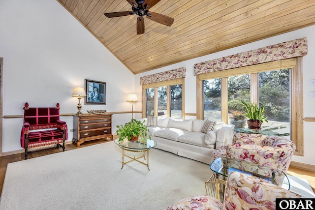 living area with wooden ceiling, plenty of natural light, high vaulted ceiling, and wood finished floors