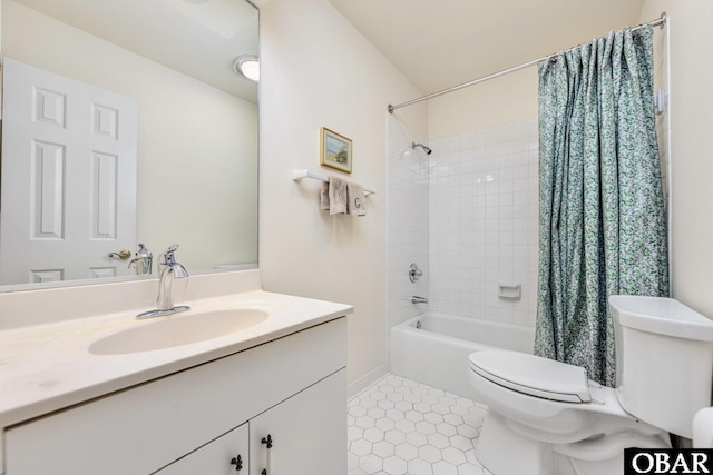 full bathroom featuring shower / tub combo, vanity, toilet, and tile patterned floors