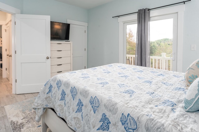 bedroom with light wood-style floors