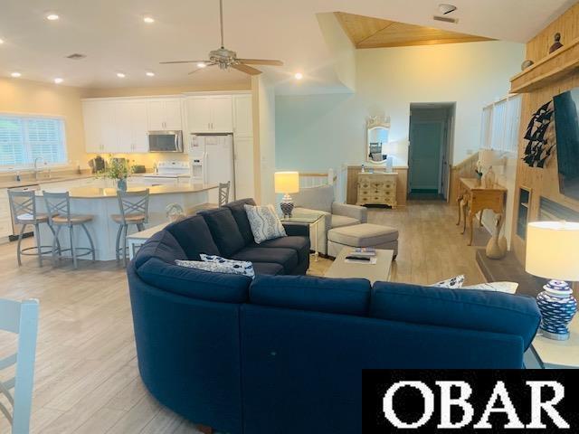 125 Foresail Ct Lot 37, Duck, NC 27949 - living room featuring a ceiling fan and light wood finished floors