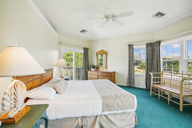 125 Foresail Ct Lot 37, Duck, NC 27949 - carpeted bedroom with access to exterior, baseboards, and a ceiling fan