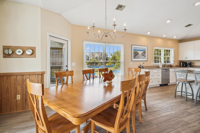 125 Foresail Ct Lot 37, Duck, NC 27949 - dining room with a chandelier, light wood-style floors, and vaulted ceiling