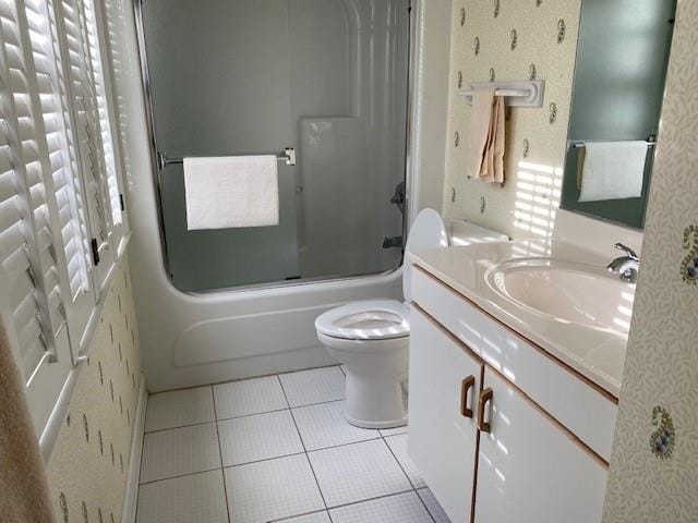 125 Foresail Ct Lot 37, Duck, NC 27949 - bathroom featuring tile patterned floors, toilet, vanity, and combined bath / shower with glass door