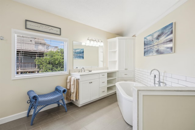125 Foresail Ct Lot 37, Duck, NC 27949 - full bath with vanity, a soaking tub, and tile patterned floors