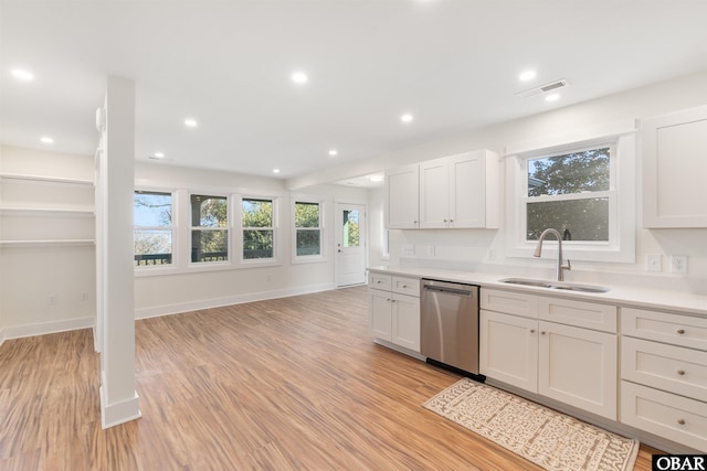 kitchen with visible vents, light wood-style flooring, recessed lighting, a sink, and dishwasher