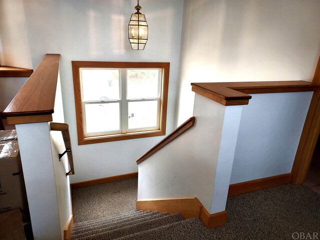 3111 Atlantic View Ct Lot 17, Nags Head, NC 27959 - stairs with carpet floors, baseboards, and a notable chandelier