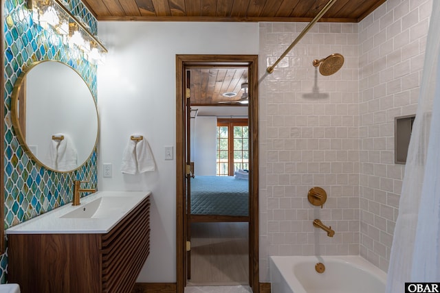 ensuite bathroom with shower / tub combo, wood ceiling, vanity, and ensuite bathroom