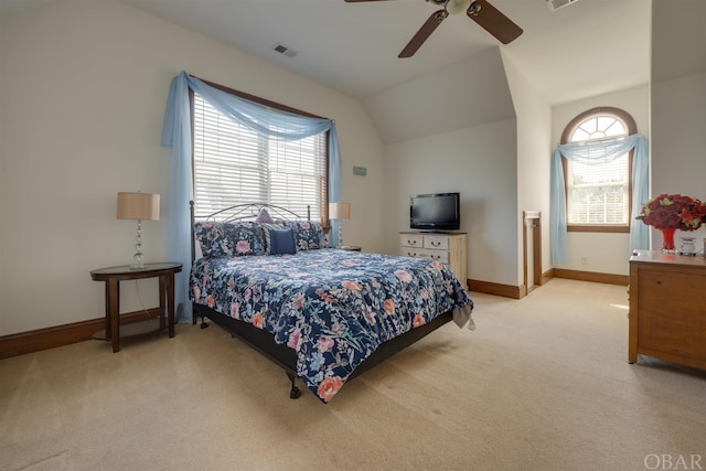 bedroom featuring light carpet, vaulted ceiling, visible vents, and baseboards