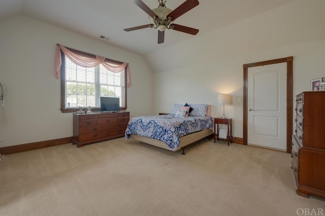 bedroom featuring light carpet, vaulted ceiling, visible vents, and baseboards