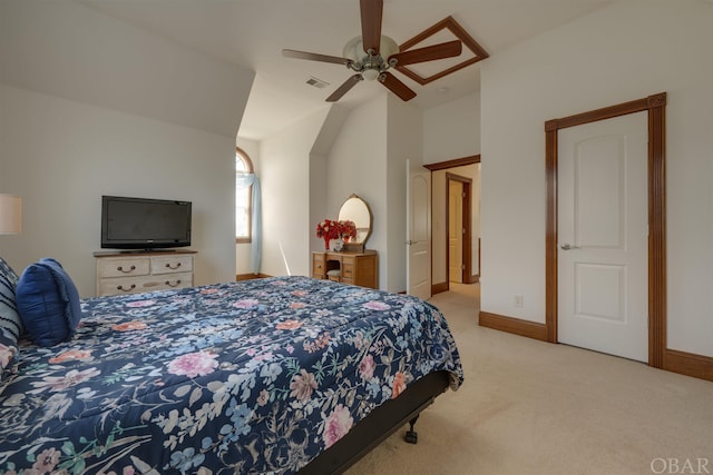 bedroom featuring lofted ceiling, visible vents, light carpet, ceiling fan, and baseboards