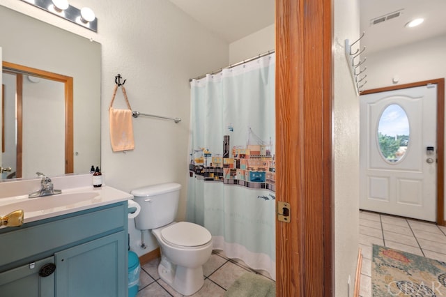 full bathroom with tile patterned flooring, visible vents, vanity, and toilet