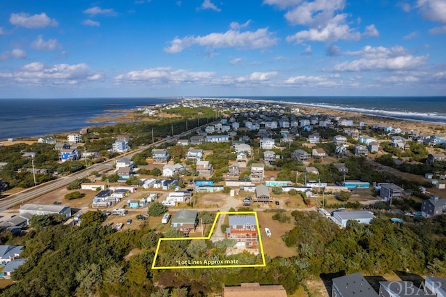 aerial view with a water view and a residential view