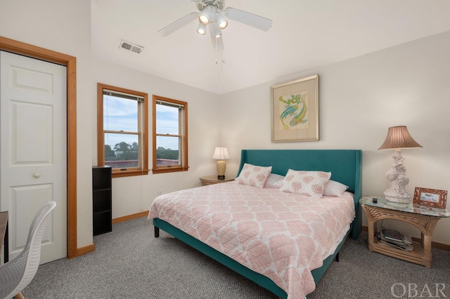 carpeted bedroom featuring visible vents, ceiling fan, and baseboards