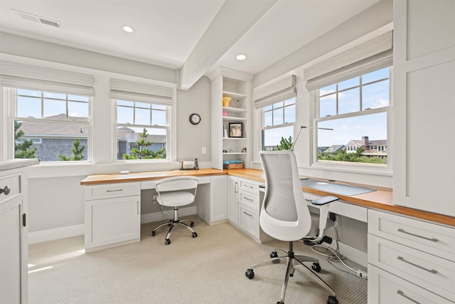 office area with baseboards, visible vents, built in desk, and recessed lighting