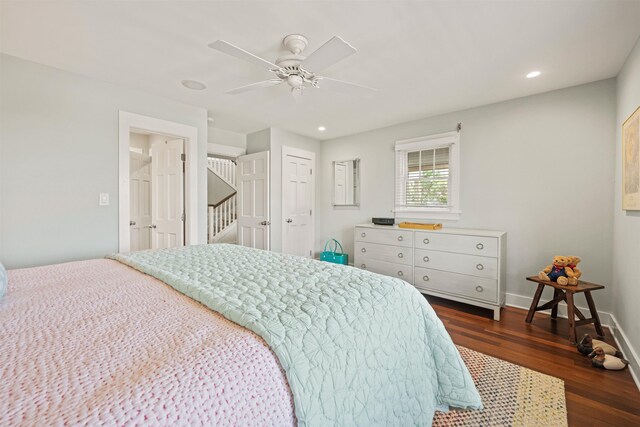 bedroom featuring a ceiling fan, recessed lighting, dark wood-style flooring, and baseboards