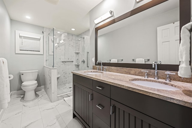 bathroom with marble finish floor, double vanity, a sink, and a marble finish shower