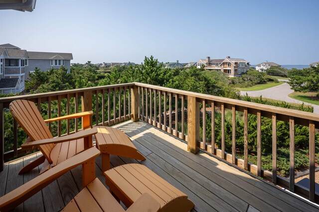 wooden deck with a residential view