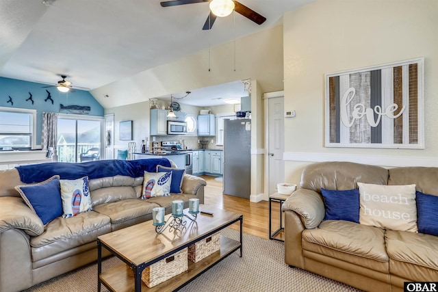 756 Lakeview Ct Lot 47, Corolla, NC 27927 - living room with ceiling fan, lofted ceiling, and light wood-style flooring
