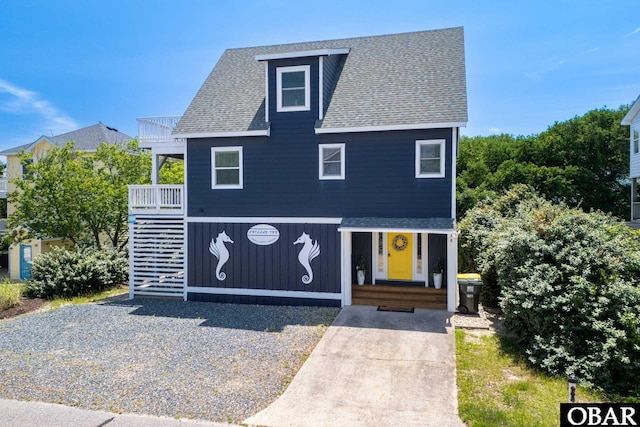 756 Lakeview Ct Lot 47, Corolla, NC 27927 - view of front of home with a shingled roof and a balcony
