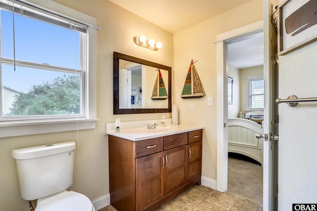 756 Lakeview Ct Lot 47, Corolla, NC 27927 - ensuite bathroom with vanity, toilet, baseboards, and tile patterned floors