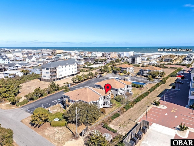 bird's eye view featuring a residential view and a water view