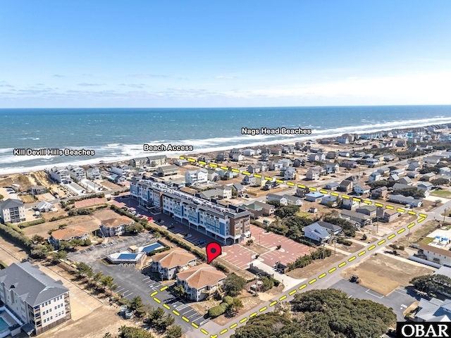 aerial view with a water view and a residential view