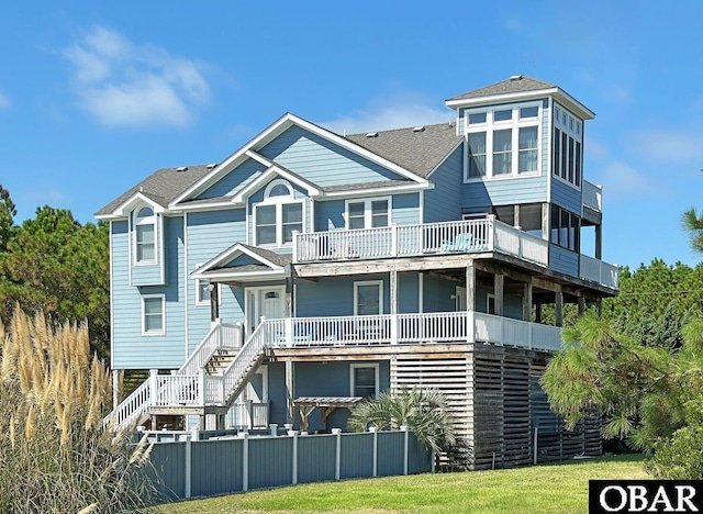 view of front of home with roof with shingles