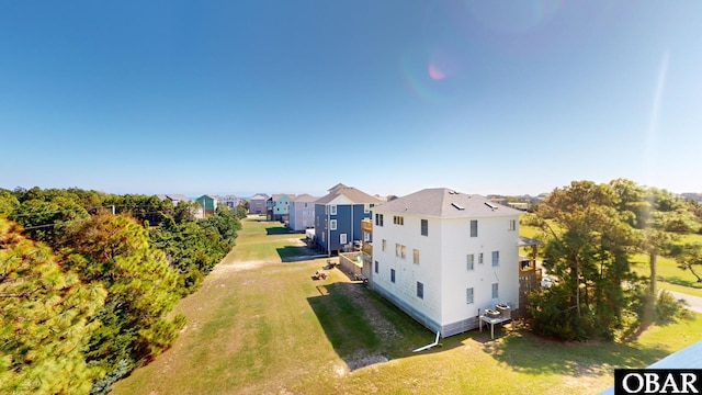 birds eye view of property with a residential view