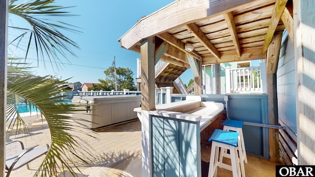 view of patio featuring a hot tub