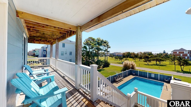 view of pool featuring a fenced in pool and a lawn