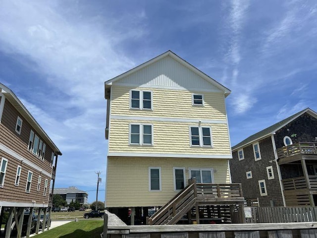 rear view of property with a deck