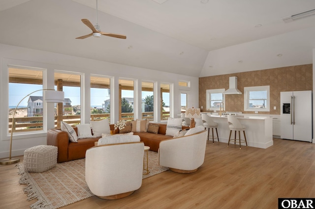 2072 Sandfiddler Rd Lot 85, Corolla, NC 27927 - living room with ceiling fan, high vaulted ceiling, and light wood-type flooring