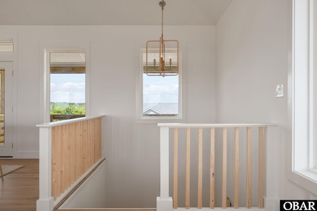 2072 Sandfiddler Rd Lot 85, Corolla, NC 27927 - stairway featuring a chandelier and wood finished floors
