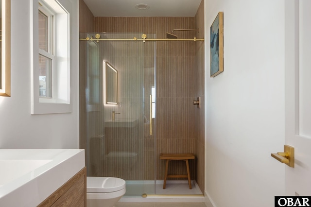 2072 Sandfiddler Rd Lot 85, Corolla, NC 27927 - bathroom featuring vanity, toilet, and a stall shower