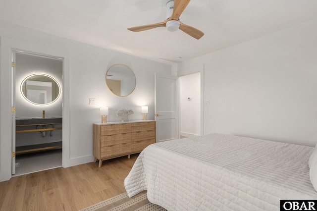 2072 Sandfiddler Rd Lot 85, Corolla, NC 27927 - bedroom featuring wood finished floors, baseboards, and a ceiling fan