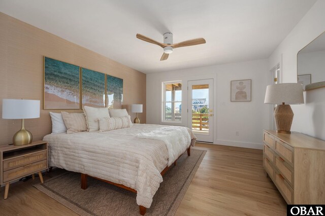 2072 Sandfiddler Rd Lot 85, Corolla, NC 27927 - bedroom featuring access to exterior, light wood finished floors, baseboards, and a ceiling fan