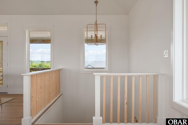 2072 Sandfiddler Rd Lot 85, Corolla, NC 27927 - stairway featuring a chandelier and wood finished floors