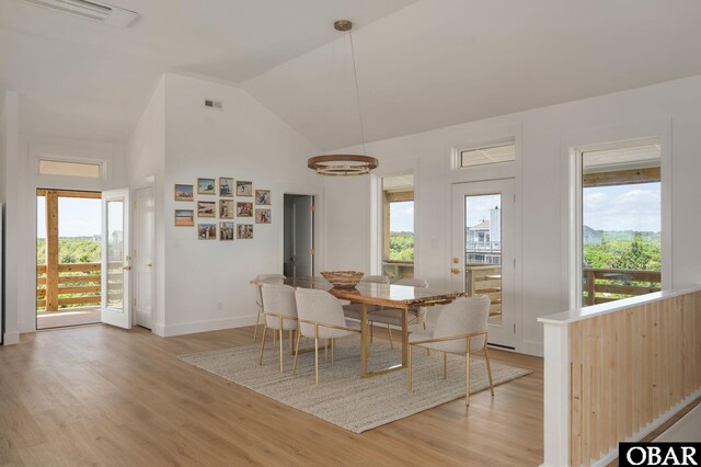 2072 Sandfiddler Rd Lot 85, Corolla, NC 27927 - dining room featuring light wood finished floors, plenty of natural light, vaulted ceiling, and baseboards