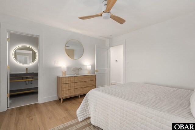2072 Sandfiddler Rd Lot 85, Corolla, NC 27927 - bedroom featuring wood finished floors, baseboards, and a ceiling fan