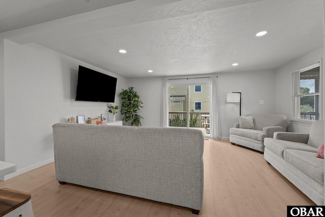 40048 Marlin Dr Lot 152, Avon, NC 27915 - living room with light wood-type flooring, recessed lighting, baseboards, and a textured ceiling