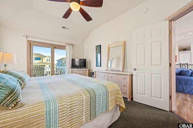 bedroom with visible vents, ceiling fan, access to exterior, vaulted ceiling, and carpet flooring