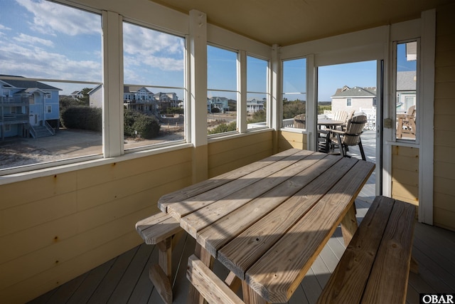 sunroom with a residential view