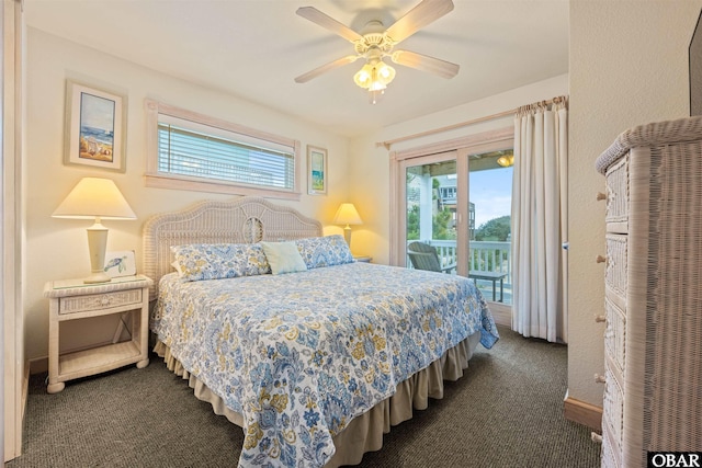 bedroom featuring ceiling fan, dark carpet, and access to exterior