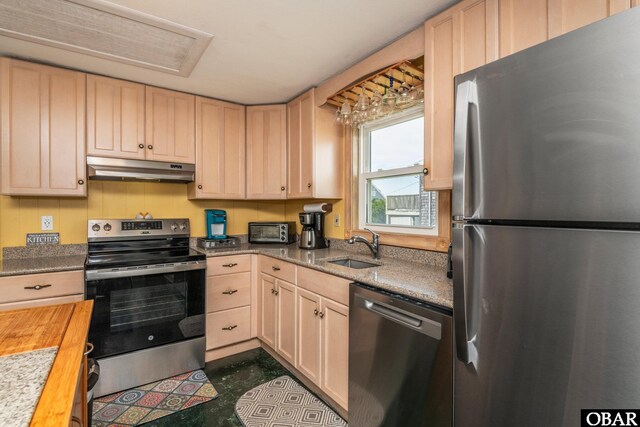 23193 W Corbina Dr Lot 24, Rodanthe, NC 27968 - kitchen with stainless steel appliances, light brown cabinetry, a sink, wood counters, and under cabinet range hood