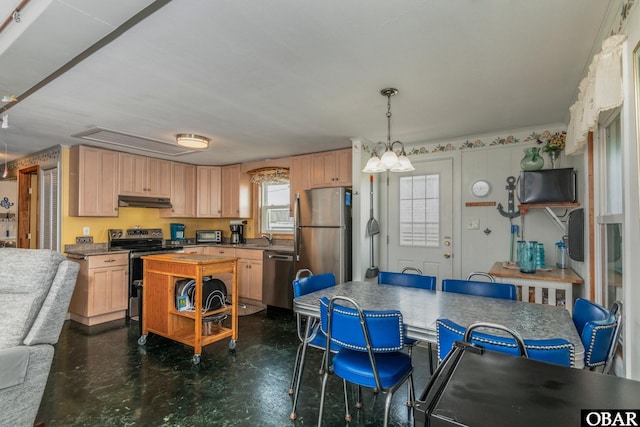 23193 W Corbina Dr Lot 24, Rodanthe, NC 27968 - kitchen with a sink, a notable chandelier, light brown cabinets, under cabinet range hood, and appliances with stainless steel finishes