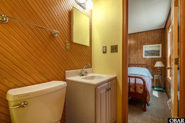 23193 W Corbina Dr Lot 24, Rodanthe, NC 27968 - half bathroom featuring wooden walls, vanity, ensuite bathroom, and toilet
