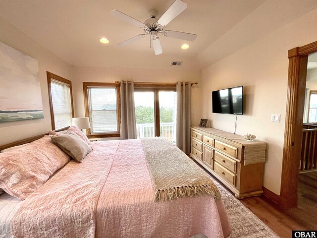 bedroom featuring recessed lighting, wood finished floors, visible vents, and access to exterior