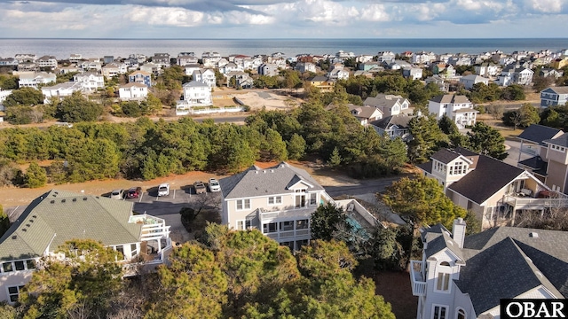 aerial view featuring a water view and a residential view