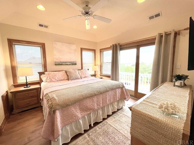 bedroom featuring recessed lighting, visible vents, and access to exterior